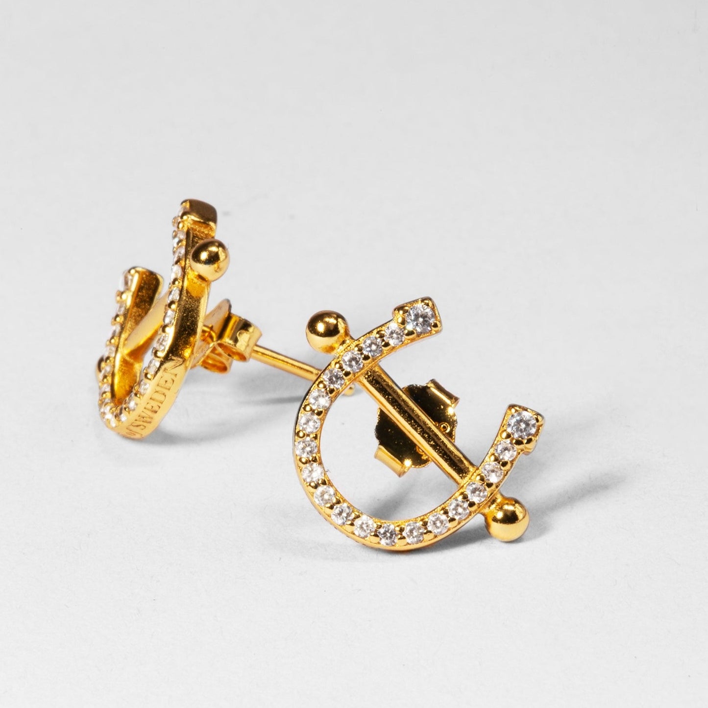 PIERCED HORSE SHOE EARRINGS Gold